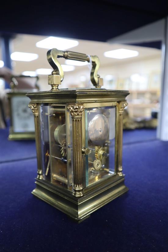 A French corinthian pattern gilt brass carriage clock with alarm, c.1900, height with handle up 16.3cm